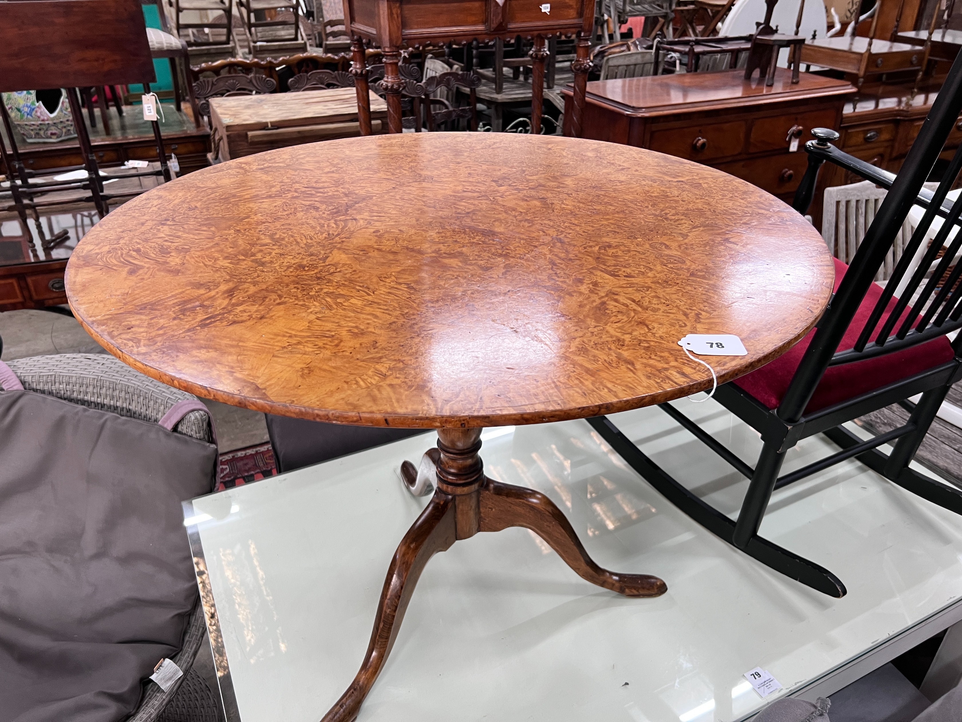 A George III bird's eye maple circular tilt top tripod tea table, diameter 88cm, height 67cm *Please note the sale commences at 9am.